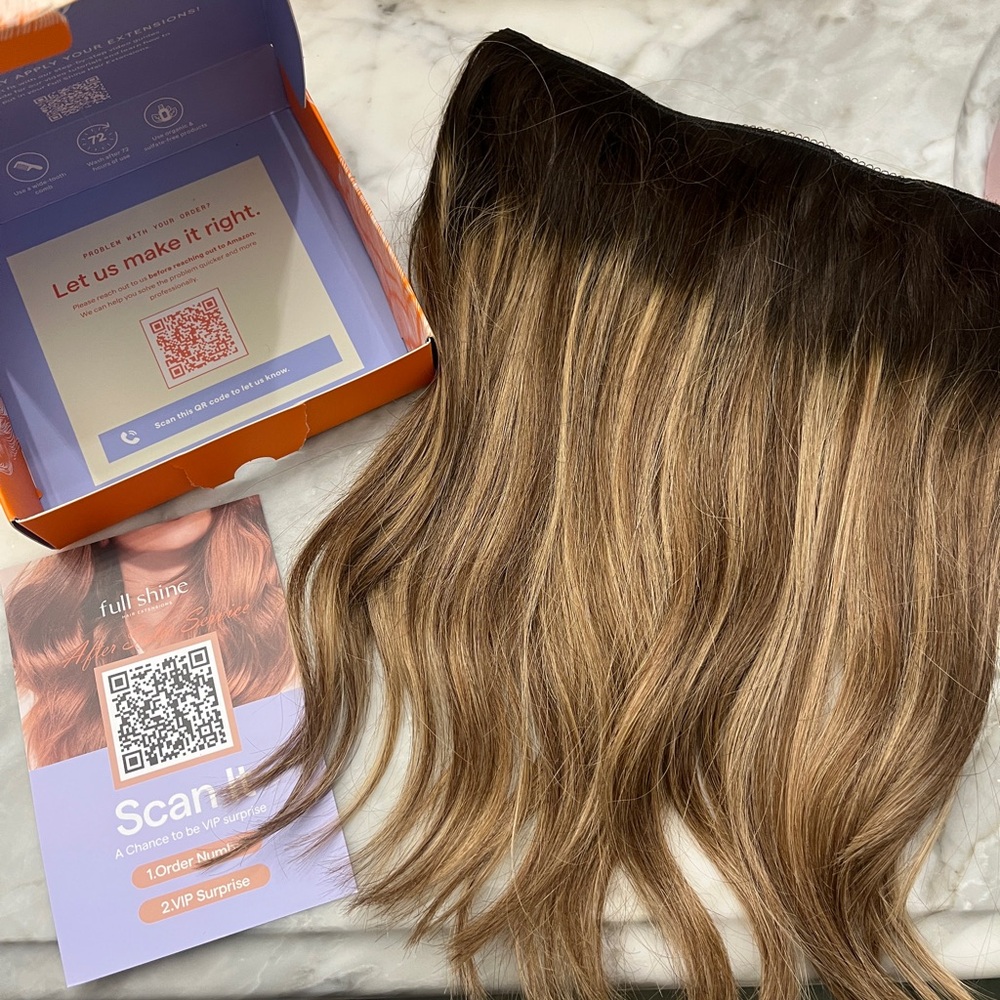 Brown to honey blonde clip in human hair extensions